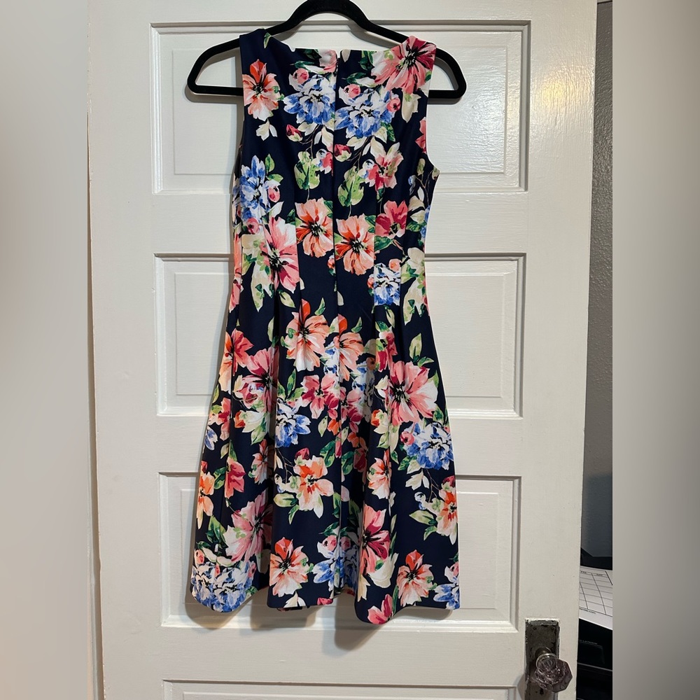 Vince Camuto floral dress with pleats and pockets.